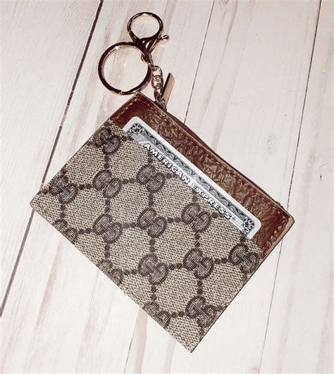 vintage gucci key chain|Gucci keychain wallet dupe.